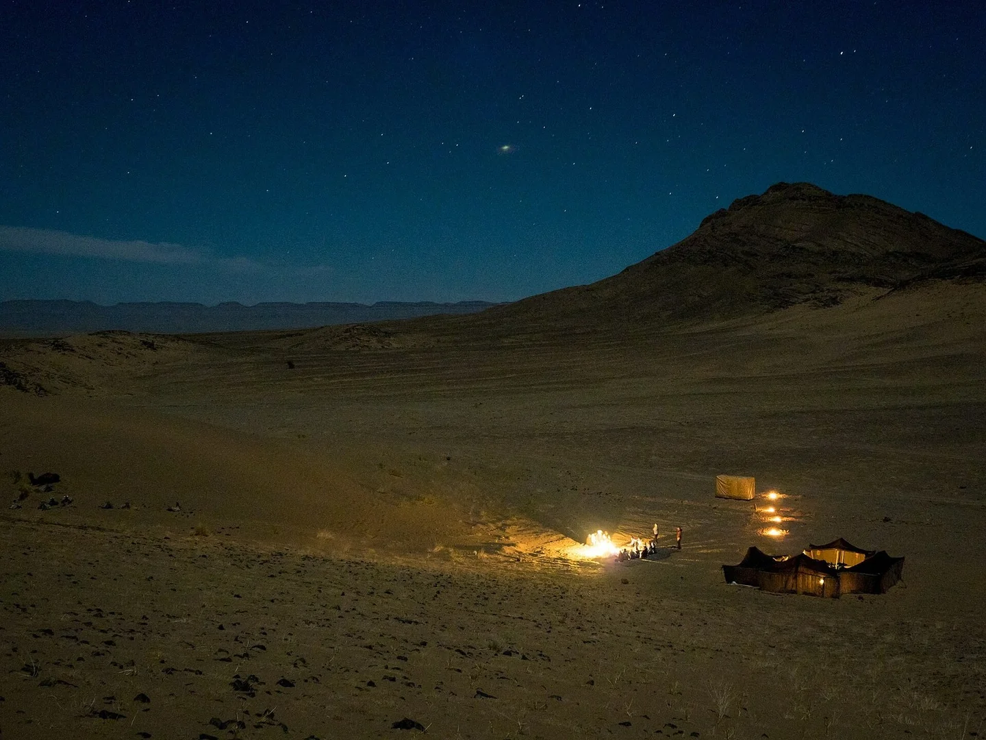 Desert camp under the stars beside the Erg Chebbi dunes near Merzouga in April